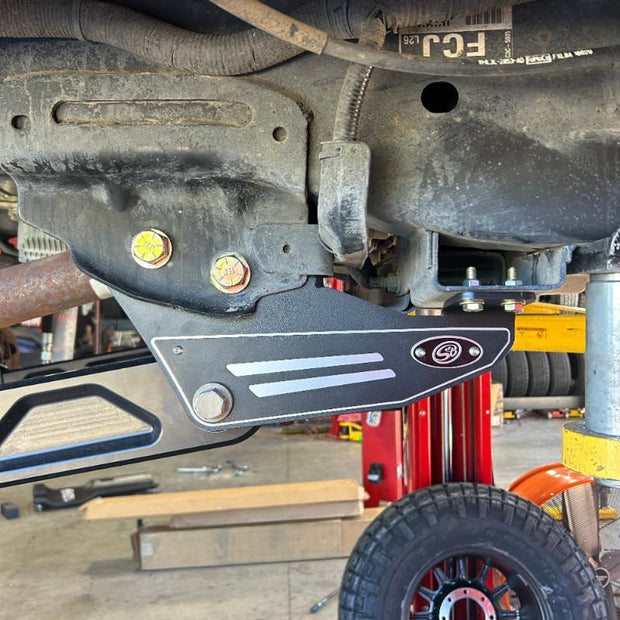 Close-up of an SB Aluminum Beam Arms (2005-2022 Super Duty) installed in a truck