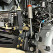 Undercarriage view of a vehicle showing the front suspension of an  SB Fully Loaded Kit For 2011-2016 F450  and steering system components.