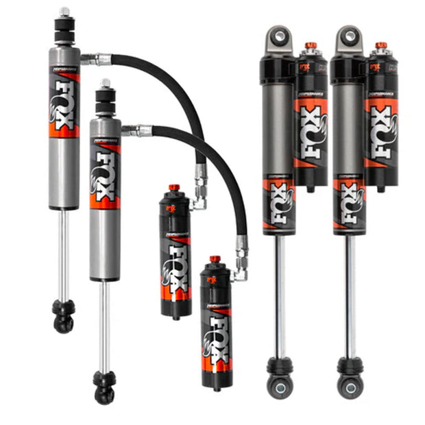 A set of Fox 2.5 Performance Elite Shock Package for 2.5" Lift Height Super Duty in a white background
