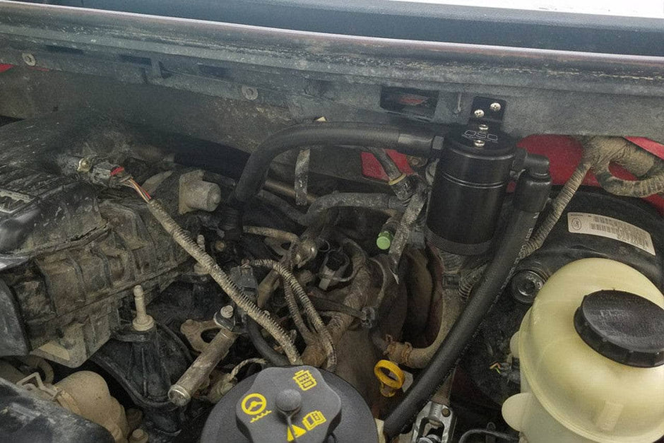 J&L Oil Separator 3.0 Driver Side, Black Anodized, installed  in a car- S&B