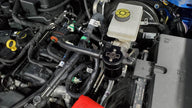 J&L Oil Separator 3.0 Driver Side, Black Anodized mounted on a cart
- S&B