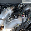 Open car hood revealing an SB Upper MAP Sensor Spacer Kit for 2017-2025 Duramax L5P - S&B