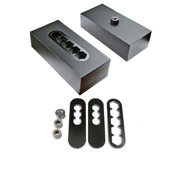 A set of black billet steel, 2.5 degree lift block kit including screws, pin nuts, pin plates, and hex pin plates.