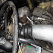 Close-up of an SB Filters Hot and Cold Side Boot Kit For 2004.5-2005 Chevy / GMC Duramax 6.6L (LLY) with visible hoses and metal parts.