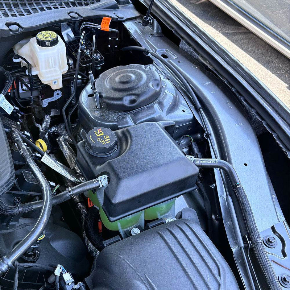 JLT Coolant Tank Cover For 2024-2025 Ford Mustang GT, Ecoboost - S&B  installed in the engine compartment of a vehicle.