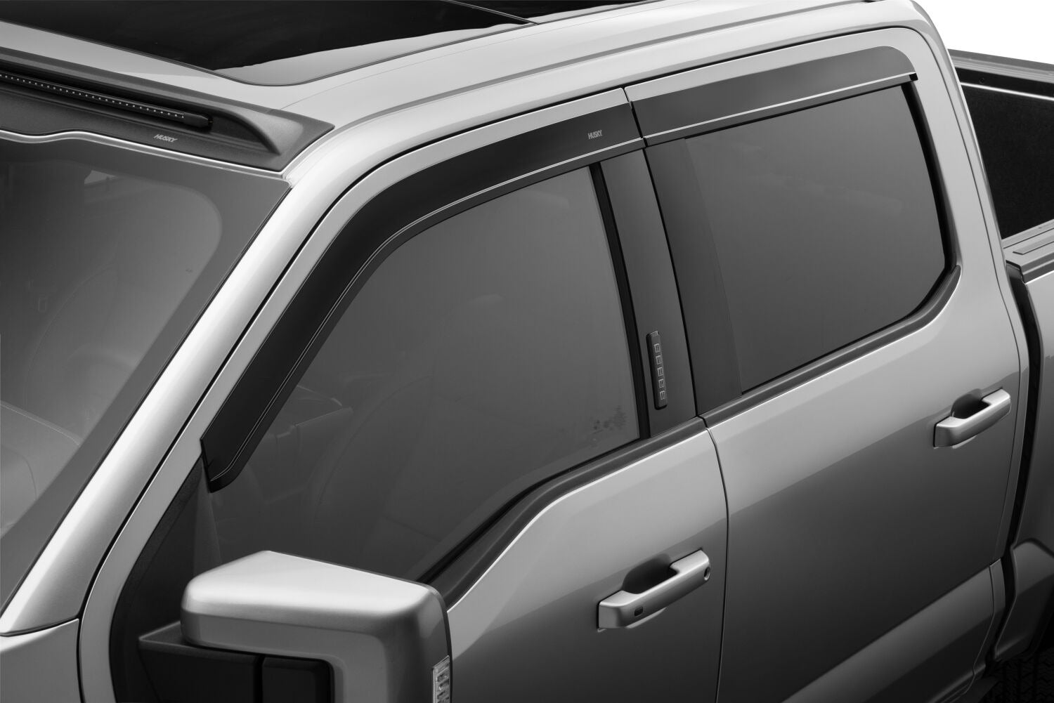 Husky Liners 2854044 Low Profile Dark Smoke Ventvisor Side Window Deflector 4-Piece Set For 2015-2026 Ford F-150 Crew Cab; 2022-2026 Ford F-150 Lightning; 2017-2026 Ford F-250/F-350/F-450 Superduty Crew Cab