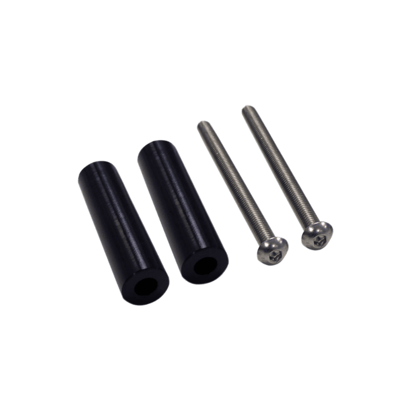 Two S&B black cylindrical 3-inch spacers for a particle separator