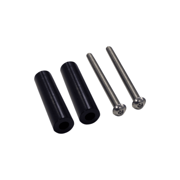 Two S&B black cylindrical 3-inch spacers for a particle separator